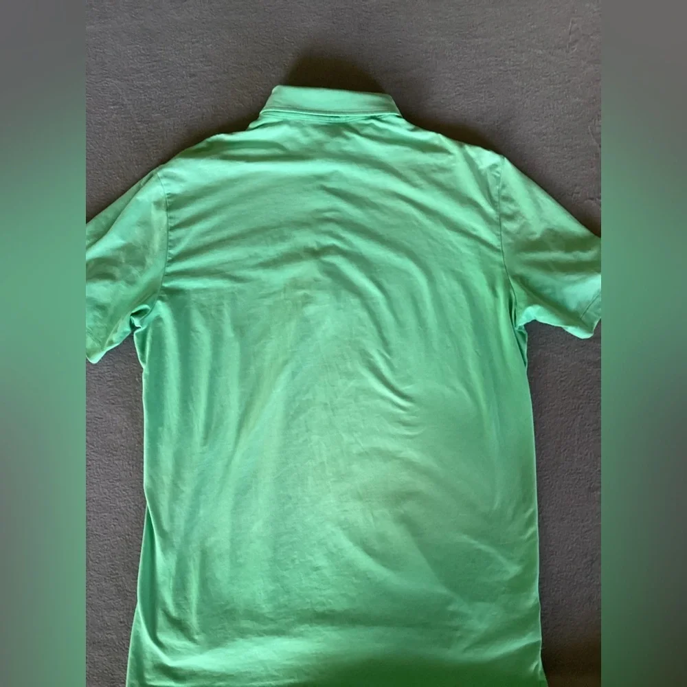 Polo Golf Ralph Lauren stretch Lisle-mint green-SZ L
Length 29.5”
Pit to pit 21” - Picture 2 of 6